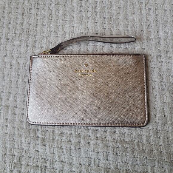 kate spade Handbags - Kate Spade New York Rose Gold Saffiano Leather Wristlet